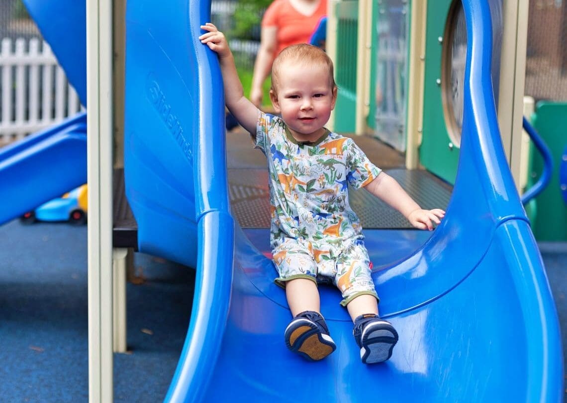 Happy Toddler on Slide